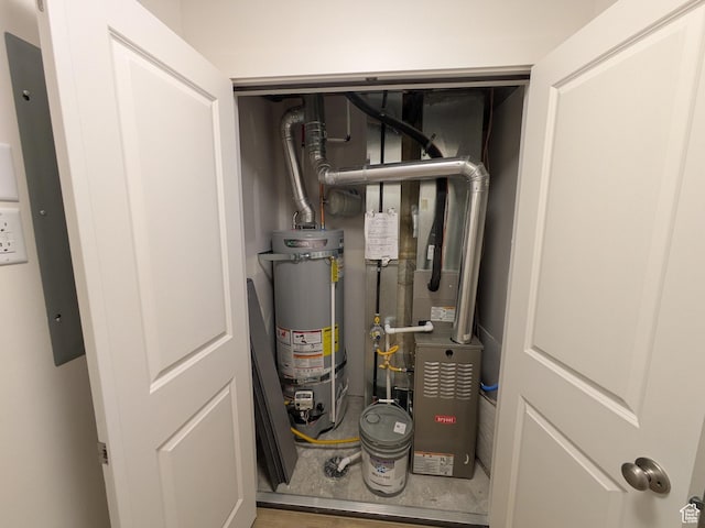 340 N 2650 W Unit 16, Tremonton, UT 84337 - utility room with secured water heater and heating unit