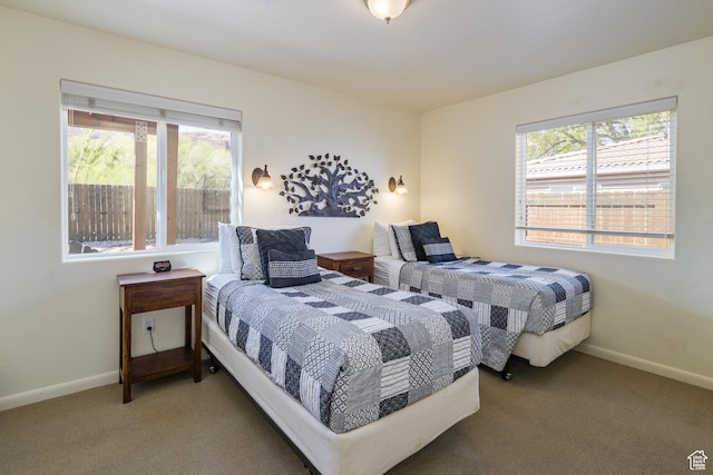 327 W Williams Way, Moab, UT 84532 - carpeted bedroom featuring baseboards