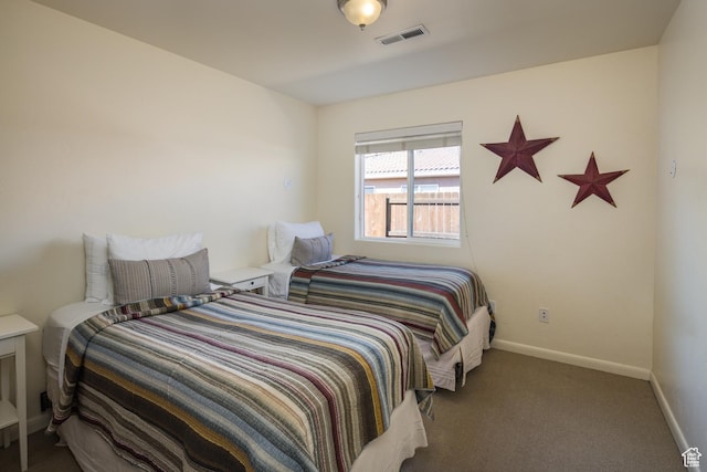 327 W Williams Way, Moab, UT 84532 - bedroom featuring baseboards, visible vents, and carpet