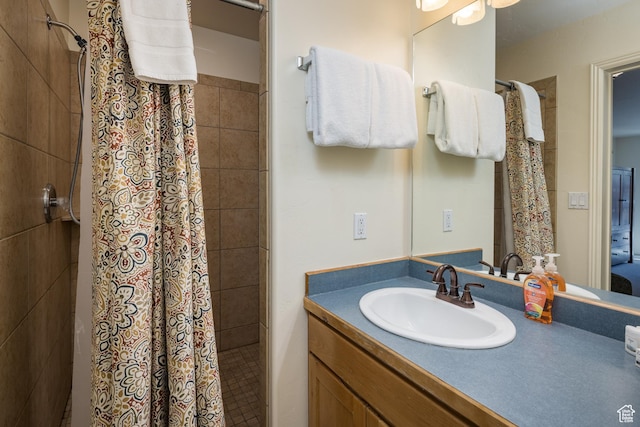 327 W Williams Way, Moab, UT 84532 - bathroom featuring vanity and tiled shower
