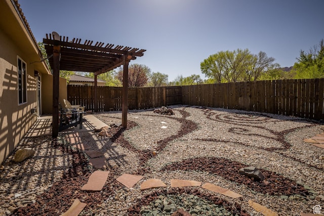 327 W Williams Way, Moab, UT 84532 - view of yard with a fenced backyard, a patio area, and a pergola