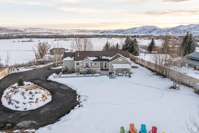 528 W Weber Canyon Rd, Oakley, UT 84055 - snowy aerial view featuring a mountain view