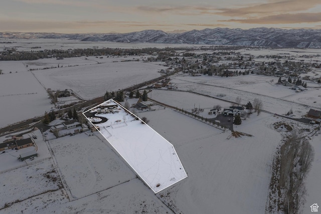 528 W Weber Canyon Rd, Oakley, UT 84055 - snowy aerial view with a mountain view