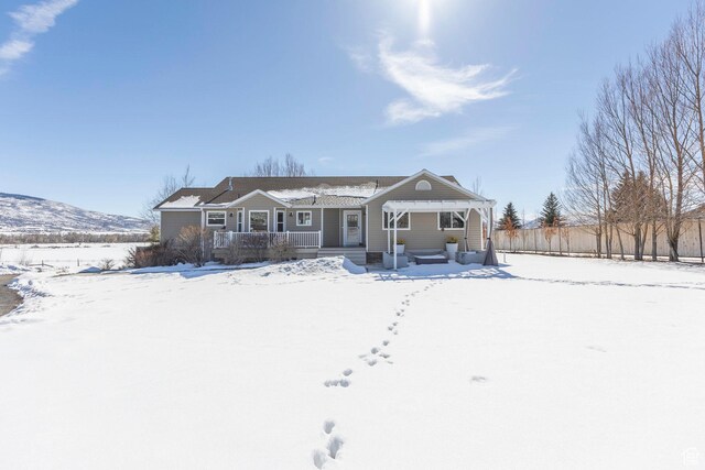 528 W Weber Canyon Rd, Oakley, UT 84055 - ranch-style house featuring covered porch