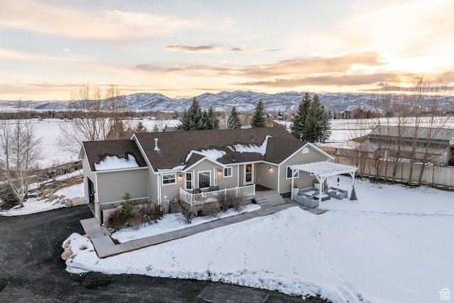 528 W Weber Canyon Rd, Oakley, UT 84055 - view of front of home with a porch and a mountain view