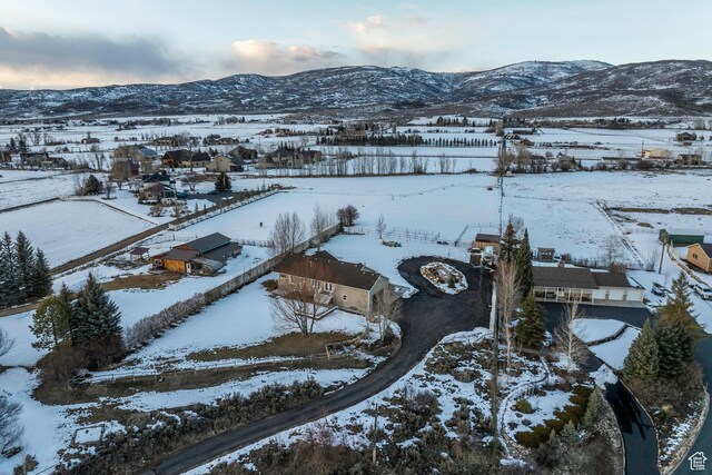528 W Weber Canyon Rd, Oakley, UT 84055 - snowy aerial view featuring a mountain view