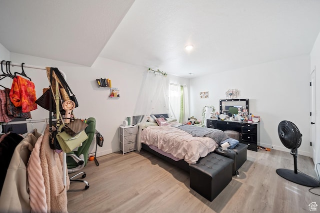 6149 W Moon Valley Dr S, South Jordan, UT 84009 - bedroom with wood finished floors and baseboards