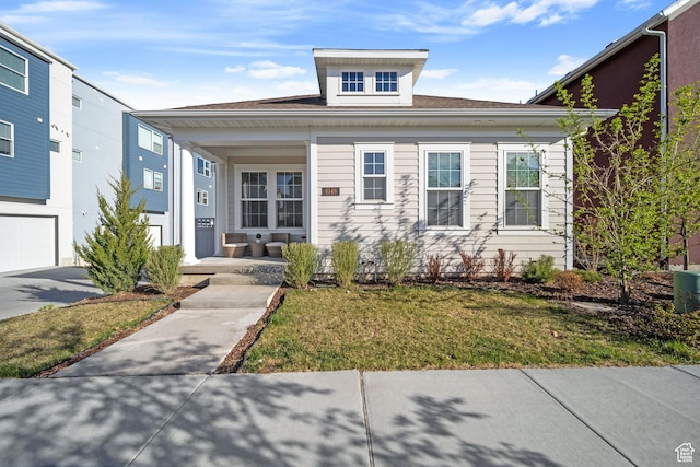 6149 W Moon Valley Dr S, South Jordan, UT 84009 - view of front of house featuring covered porch and a front yard