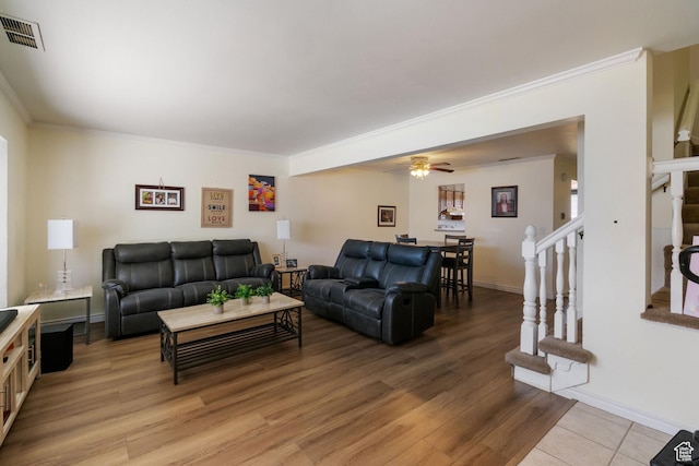 430 N 470 W Unit 14, Lehi, UT 84043 - living area with ornamental molding, a ceiling fan, stairs, light wood-style floors, and visible vents