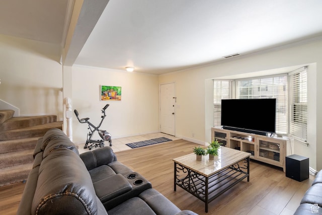 430 N 470 W Unit 14, Lehi, UT 84043 - living area with stairs, visible vents, crown molding, and wood finished floors
