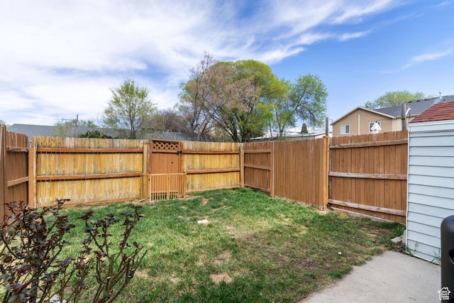 430 N 470 W Unit 14, Lehi, UT 84043 - view of yard featuring a fenced backyard and a gate