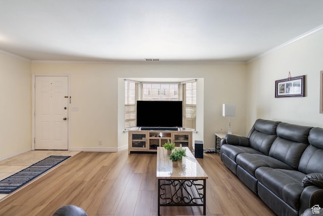 430 N 470 W Unit 14, Lehi, UT 84043 - living area featuring ornamental molding, visible vents, light wood-style flooring, and baseboards