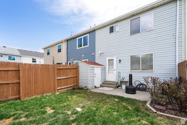 430 N 470 W Unit 14, Lehi, UT 84043 - back of property with entry steps, a yard, a fenced backyard, and a patio area