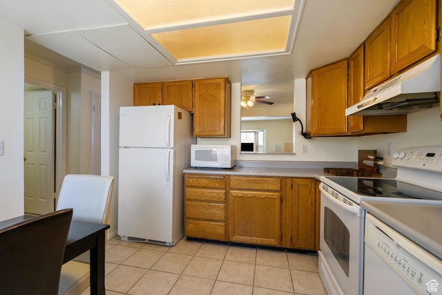 430 N 470 W Unit 14, Lehi, UT 84043 - kitchen with under cabinet range hood, white appliances, brown cabinets, and light tile patterned flooring