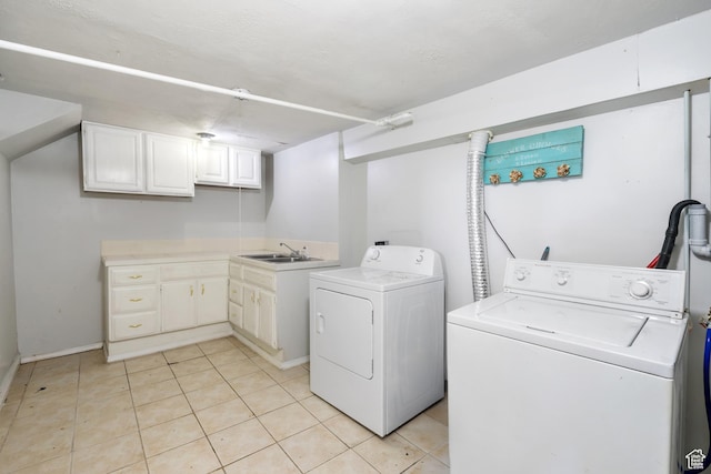 1604 Childs Ave, Ogden, UT 84404 - washroom with separate washer and dryer, baseboards, light tile patterned flooring, cabinet space, and a sink