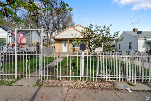 1604 Childs Ave, Ogden, UT 84404 - bungalow featuring a front yard and a fenced front yard