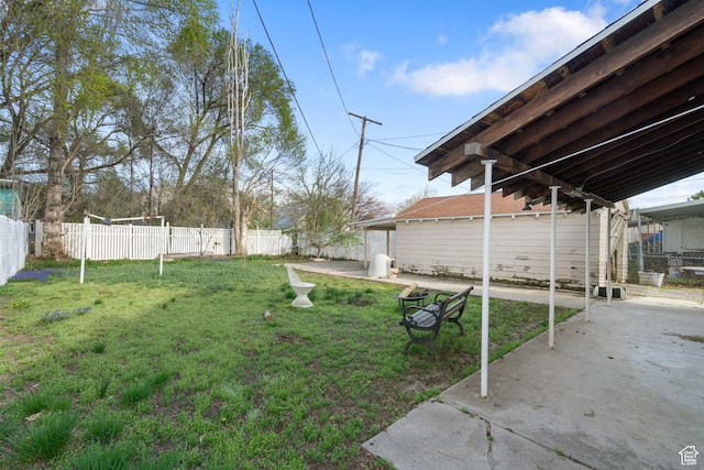 1604 Childs Ave, Ogden, UT 84404 - view of yard featuring a patio area and a fenced backyard