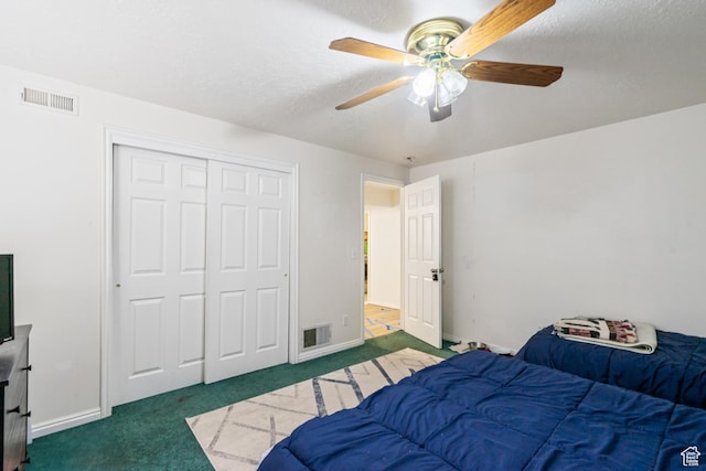 1604 Childs Ave, Ogden, UT 84404 - carpeted bedroom with visible vents, a closet, and ceiling fan