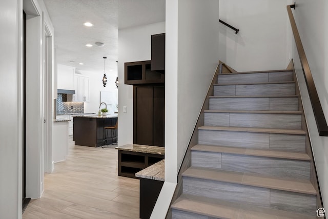 5238 W 2440 S, Hurricane, UT 84737 - staircase featuring recessed lighting