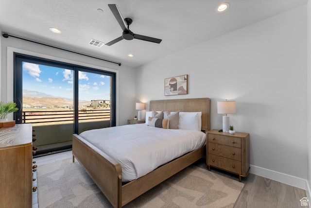 5266 W 2480 S Unit 149, Hurricane, UT 84737 - bedroom featuring access to outside, light wood-type flooring, visible vents, recessed lighting, and baseboards