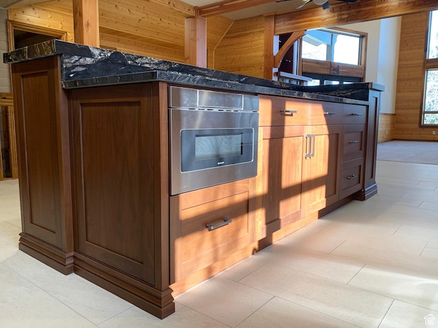 3804 E 2050 N, Eden, UT 84310 - kitchen with oven, dark stone counters, and wooden walls