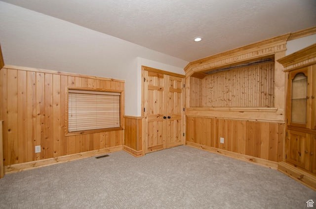 3804 E 2050 N, Eden, UT 84310 - additional living space with carpet flooring, wooden walls, and visible vents