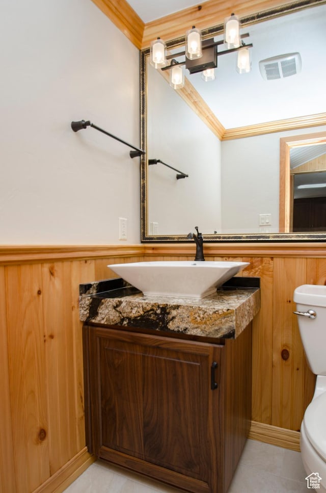 3804 E 2050 N, Eden, UT 84310 - bathroom featuring vanity, tile patterned flooring, crown molding, toilet, and visible vents