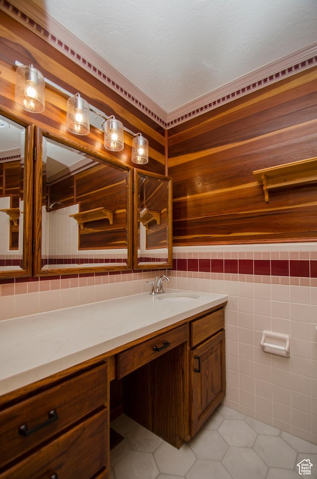 3804 E 2050 N, Eden, UT 84310 - bathroom featuring tile patterned floors, vanity, and tile walls