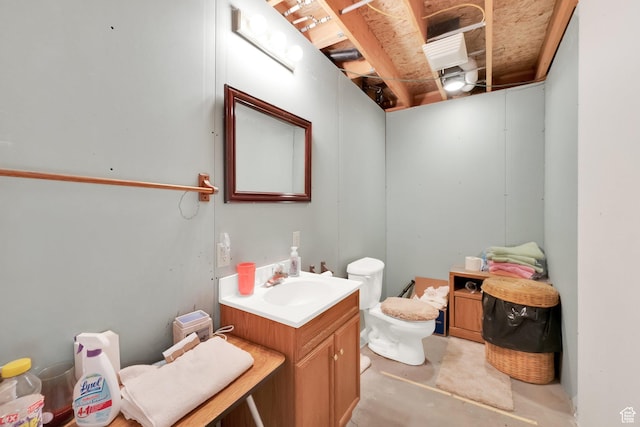 154 W Main St, Bicknell, UT 84715 - bathroom featuring unfinished concrete floors, vanity, and toilet