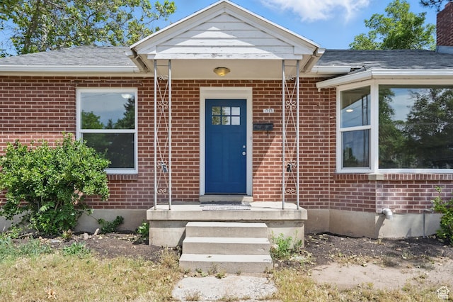 1705 E 2700 S, Salt Lake City, UT 84106 - entrance to property featuring brick siding and a shingled roof
