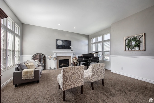 2115 N 5 E, Layton, UT 84041 - carpeted living area featuring a tiled fireplace, baseboards, and recessed lighting