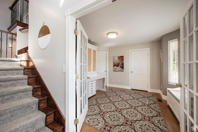 2115 N 5 E, Layton, UT 84041 - staircase with wood finished floors, baseboards, and french doors