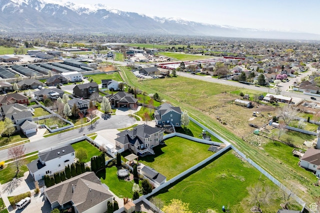 2115 N 5 E, Layton, UT 84041 - aerial overview of property's location with a mountain backdrop and nearby suburban area