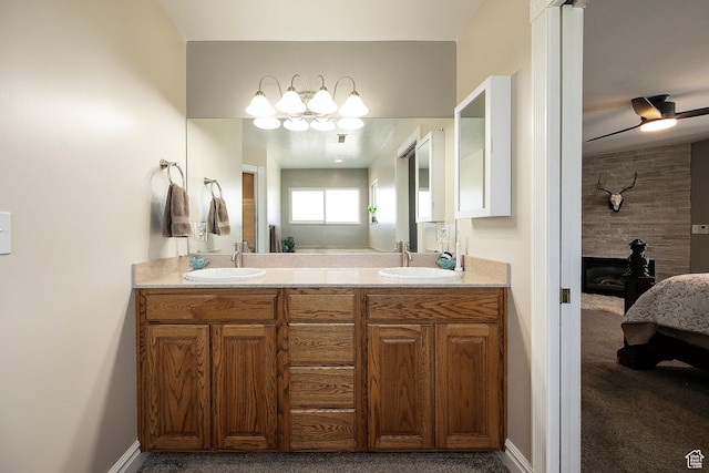 2115 N 5 E, Layton, UT 84041 - bathroom featuring ensuite bathroom, double vanity, and baseboards