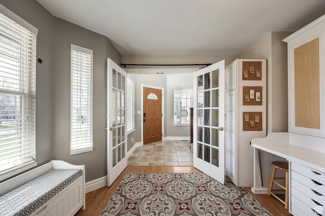2115 N 5 E, Layton, UT 84041 - entryway featuring french doors, light wood-style flooring, healthy amount of natural light, and radiator