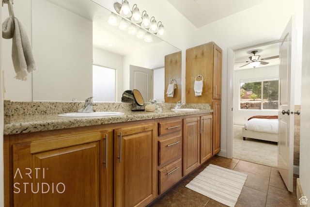 1971 S Great Basin Dr, Washington, UT 84780 - ensuite bathroom featuring double vanity, tile patterned floors, and a ceiling fan