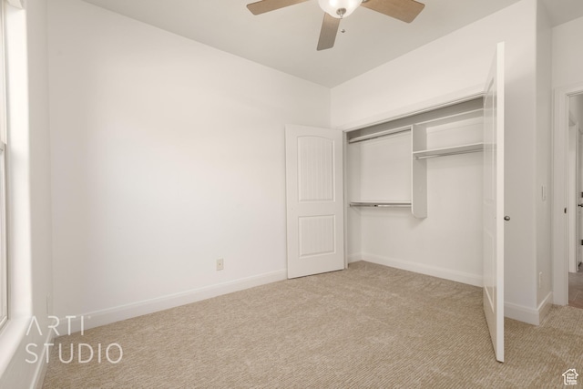 1971 S Great Basin Dr, Washington, UT 84780 - unfurnished bedroom with light carpet, a closet, and a ceiling fan