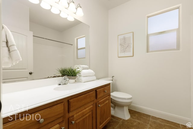 1971 S Great Basin Dr, Washington, UT 84780 - full bath featuring vanity, tile patterned flooring, and a shower