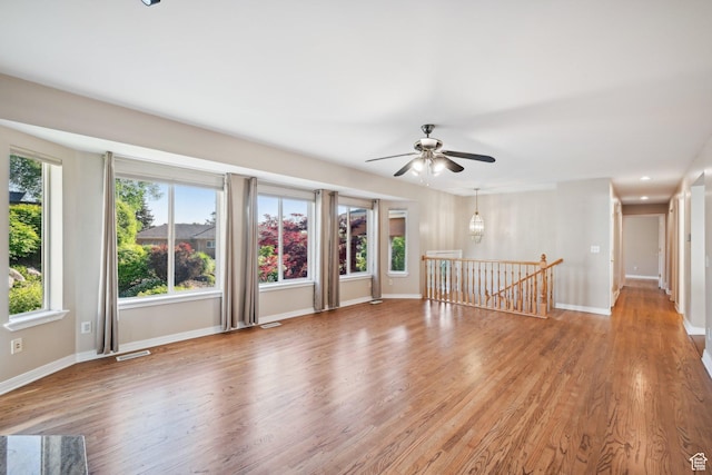3391 E Brockbank Dr S, Millcreek, UT 84124 - spare room with a ceiling fan, light wood-type flooring, and baseboards