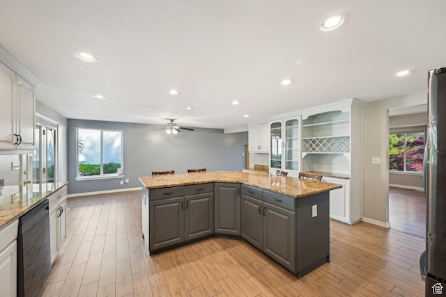 3391 E Brockbank Dr S, Millcreek, UT 84124 - kitchen with dishwasher, gray cabinets, white cabinets, a kitchen island, and freestanding refrigerator