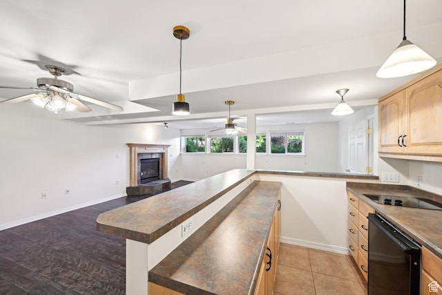 3391 E Brockbank Dr S, Millcreek, UT 84124 - kitchen with a ceiling fan, light brown cabinets, dark countertops, and black appliances