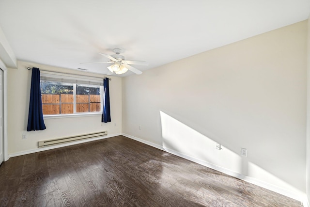 3391 E Brockbank Dr S, Millcreek, UT 84124 - empty room featuring a baseboard heating unit, a ceiling fan, wood finished floors, and baseboards
