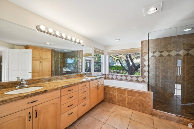 3391 E Brockbank Dr S, Millcreek, UT 84124 - full bath featuring double vanity, tile patterned flooring, a stall shower, and a garden tub