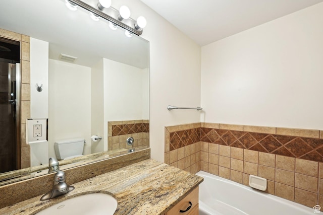 3391 E Brockbank Dr S, Millcreek, UT 84124 - bathroom with a garden tub, vanity, and toilet