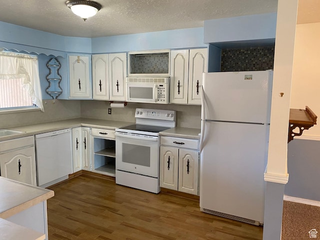 2547 E 1900 N, Layton, UT 84040 - kitchen with white cabinets, light countertops, white appliances, and wood finished floors