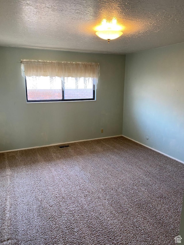 2547 E 1900 N, Layton, UT 84040 - carpeted empty room with visible vents, baseboards, and a textured ceiling