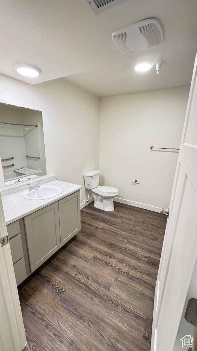 383 W 625 N A-D, Unit A-D Payson, UT 84651 - bathroom featuring vanity, visible vents, toilet, wood finished floors, and baseboards