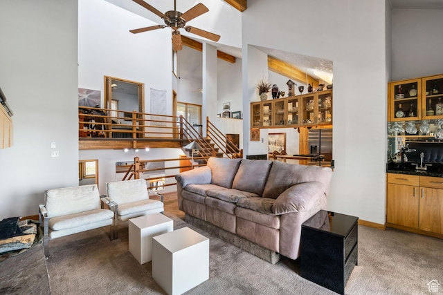4042 Saddleback Rd, Park City, UT 84098 - living area featuring high vaulted ceiling, stairway, carpet floors, and ceiling fan