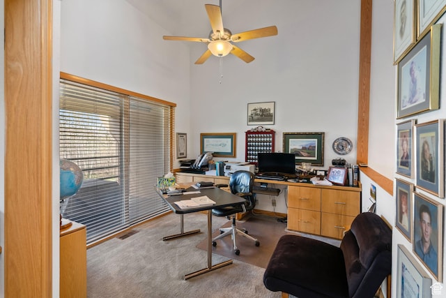 4042 Saddleback Rd, Park City, UT 84098 - office space featuring visible vents, ceiling fan, carpet, and a towering ceiling