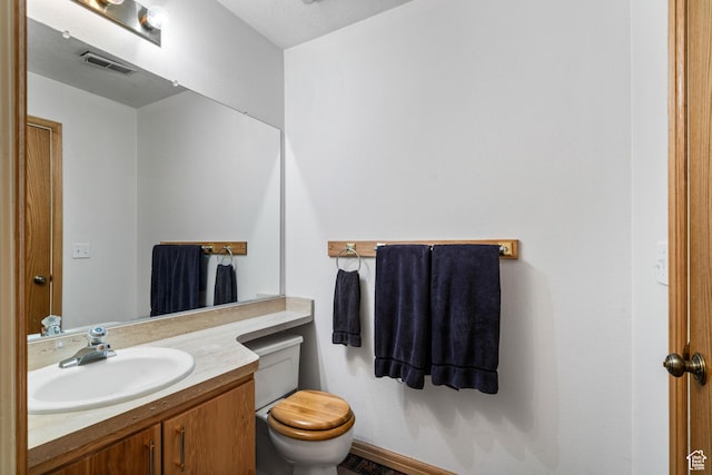 4042 Saddleback Rd, Park City, UT 84098 - bathroom with toilet, vanity, and visible vents